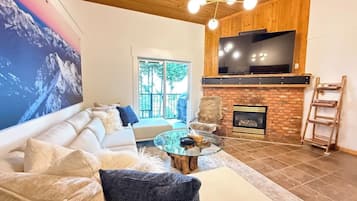 Smart TV, fireplace, foosball