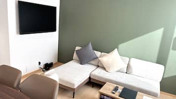 Leilighet – deluxe, balkong, fjellutsikt | Oppholdsområde