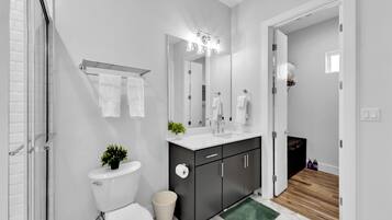 Shower, hair dryer, towels, soap