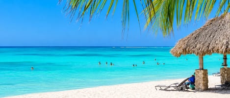 Beach nearby, white sand, beach shuttle, beach cabanas