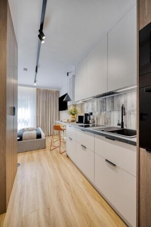 Suíte estúdio, para não fumantes, ar-condicionado | Cozinha privada