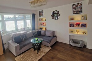 TV, fireplace - Seaside Escape in Deal, Cozy 2 Bedroom (Deal)