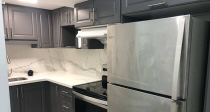 Modern Luxury Private Suite | 1+Den • 1.5 Bath • Parking