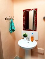 Family Apartment, City View | Bathroom | Shower, slippers, towels, soap