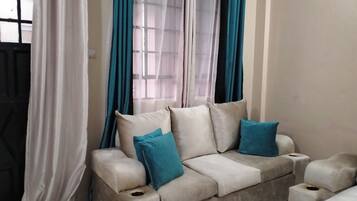 Business Apartment, City View | Living area