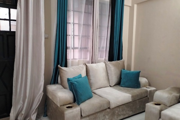 Business Apartment, City View | Living area | 32-inch Smart TV with digital channels