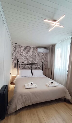 1 bedroom, desk, iron/ironing board, travel cot