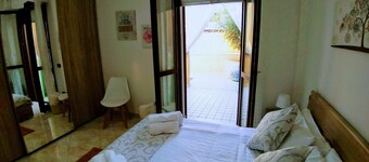 Family apartment with terrace 5 minute from the beach