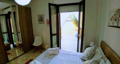Family apartment with terrace 5 minute from the beach