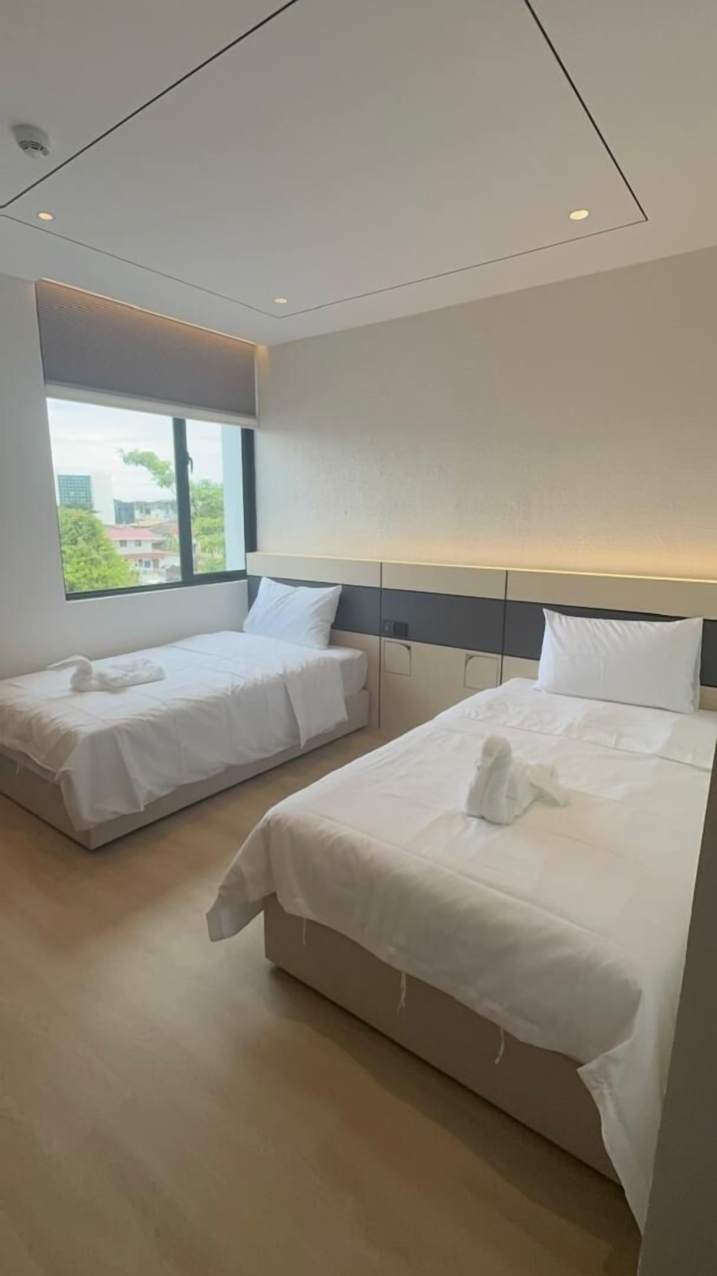 Tomannsrom – standard, 2 enkeltsenger | Skrivebord og wi-fi (inkludert)