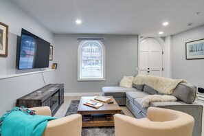 TV, fireplace, books - Walkable Townhome in the Heart of Central City! (Central City)