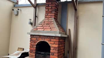 Ático familiar, vistas a la ciudad | Jardines del alojamiento