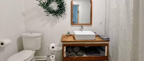 Shower, hair dryer, towels, soap