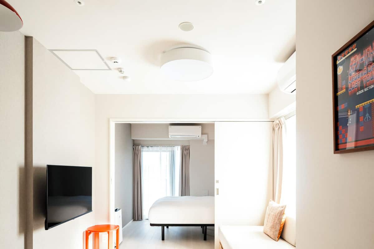 Apartemen Premier, balkon | Tirai kedap cahaya, setrika/meja setrika, dan Wi-Fi gratis