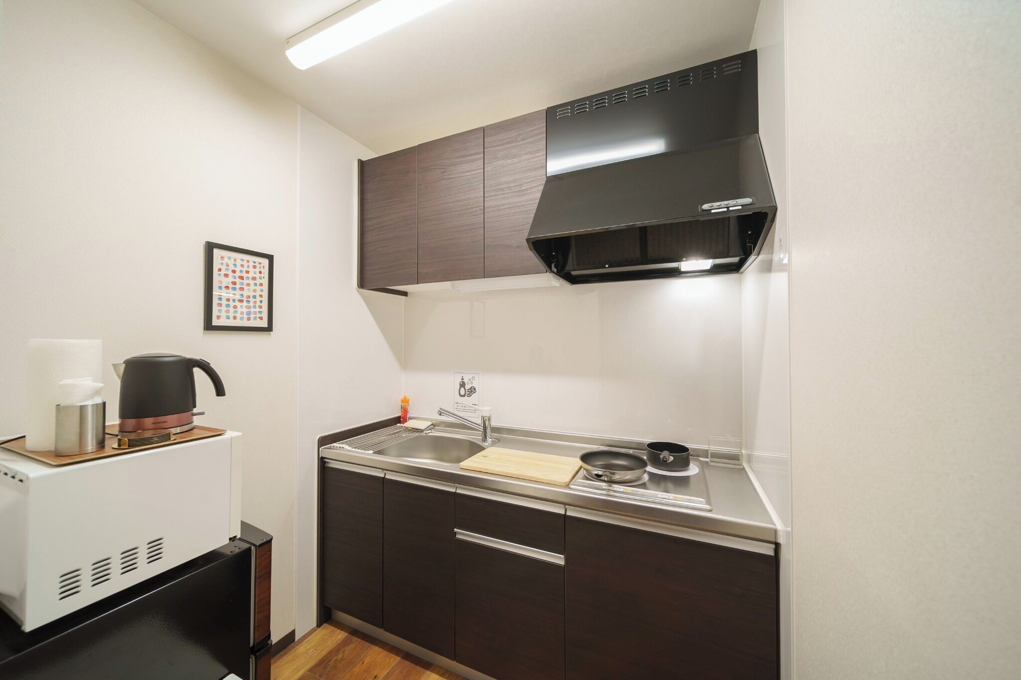 Fridge, microwave, stovetop, cookware/dishes/utensils
