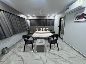 Deluxe Double Room, City View | Laptop workspace, iron/ironing board, free WiFi - Hotel HR Prime (Ahmedabad)