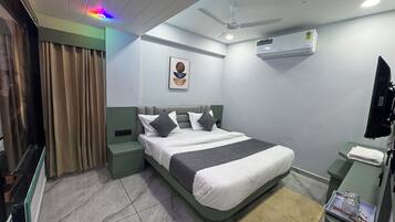 Deluxe Double Room, City View | Laptop workspace, iron/ironing board, free WiFi