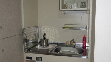 Fridge, microwave, stovetop, cookware/dishes/utensils