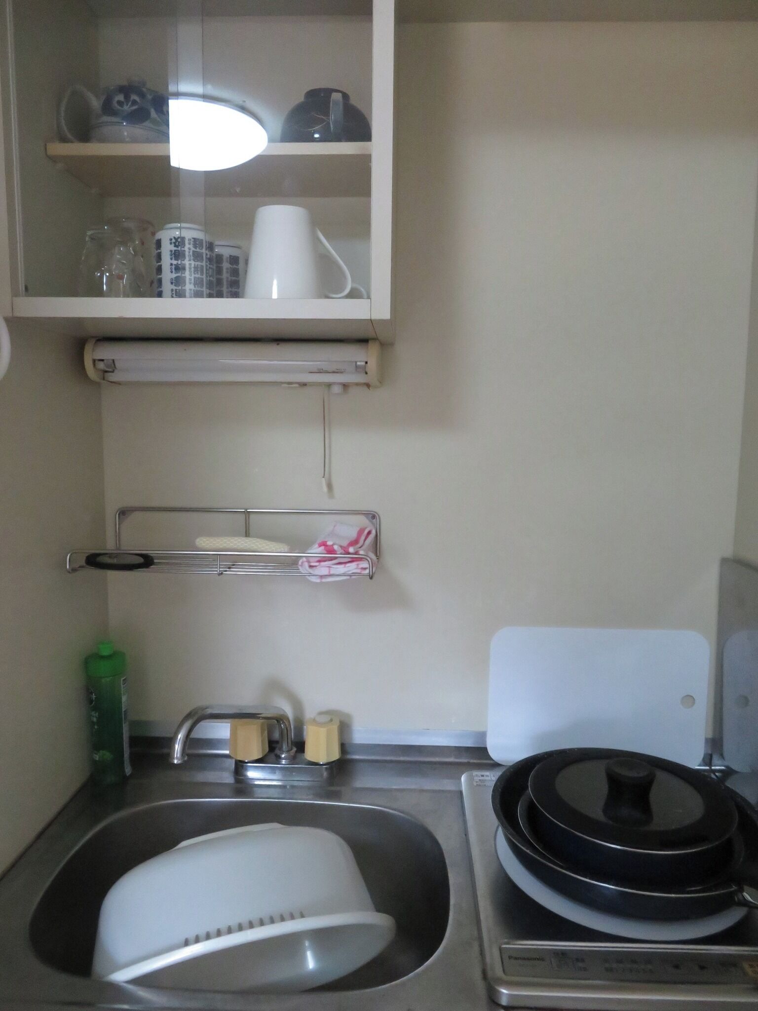 Fridge, microwave, stovetop, cookware/dishes/utensils