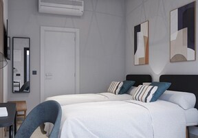 Twin Room | Premium bedding, down duvets, desk, laptop workspace