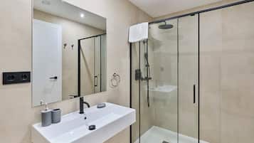 Shower, free toiletries, hair dryer, towels