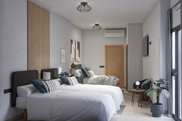 Quadruple Room | Premium bedding, down comforters, desk, laptop workspace