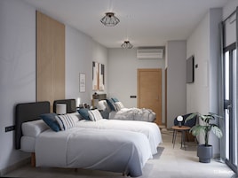 Premium bedding, down duvets, desk, laptop workspace