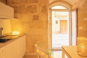 Fridge, microwave, stovetop, cookware/dishes/utensils