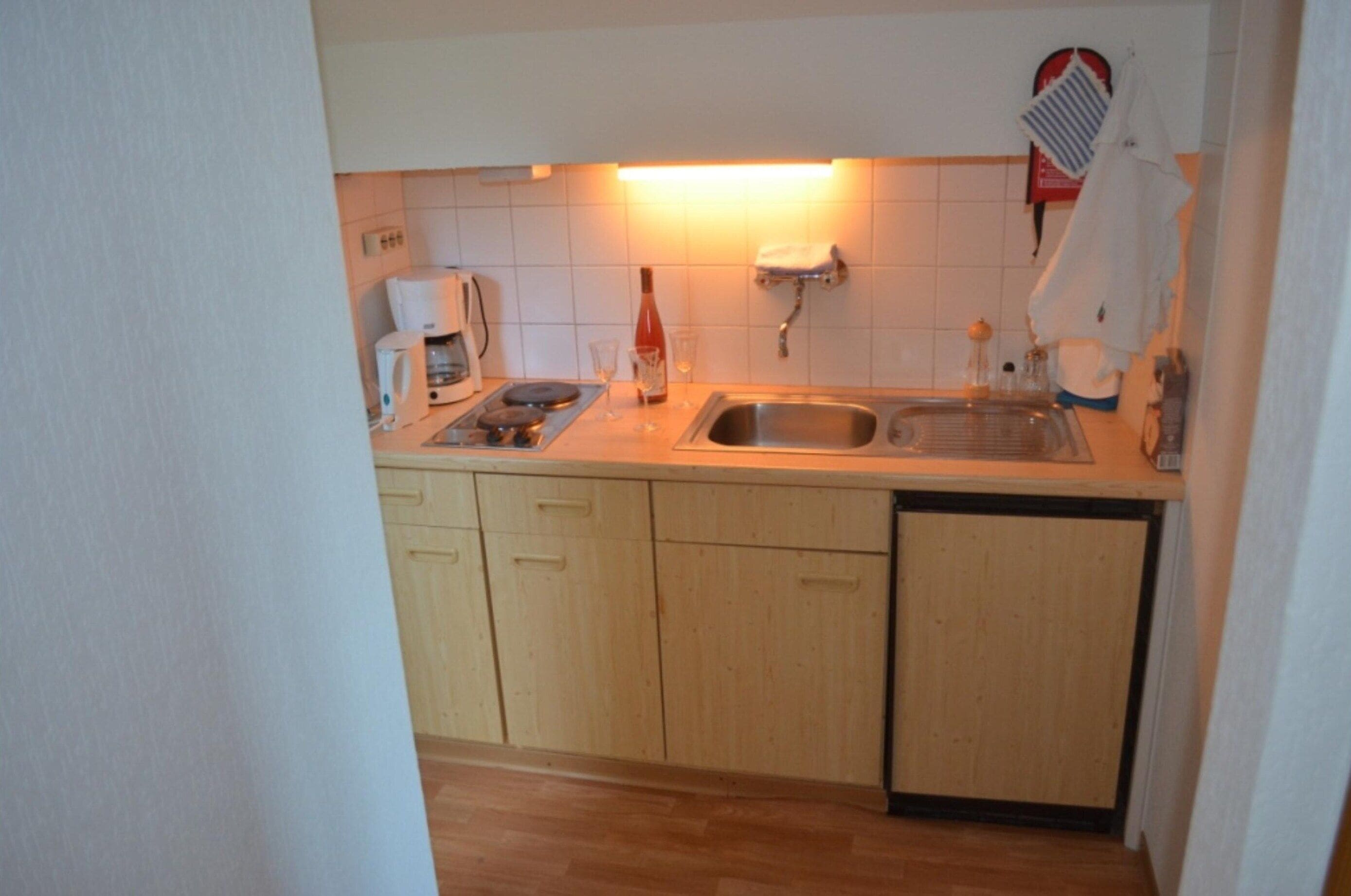 Apartemen | Dapur pribadi | Kursi makan untuk bayi