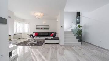 Luxury Villa, Partial Sea View | Living area | 100-cm LCD TV with satellite channels, fireplace