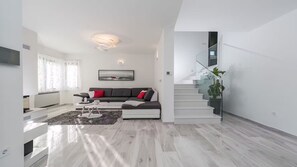 Luxury Villa, Partial Sea View | Living area | 100-cm LCD TV with satellite channels, fireplace