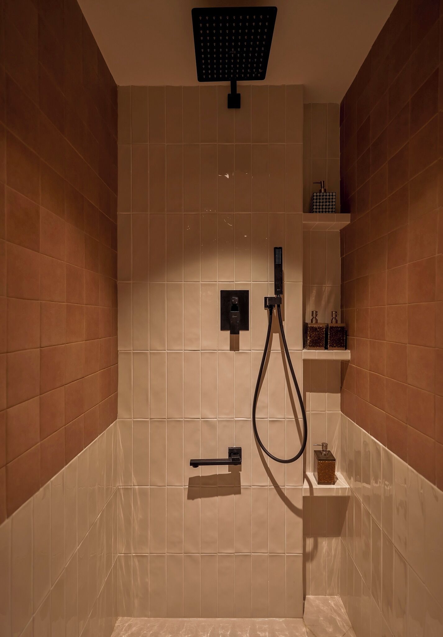 Hydromassage showerhead, designer toiletries, hair dryer, bathrobes