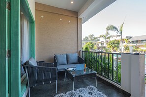 Deluxe Room, Garden View | Terrace/patio