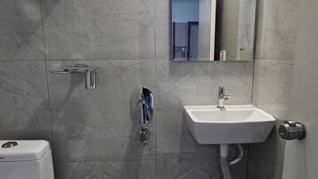 Superior Studio | Bathroom | Shower, towels, soap, shampoo