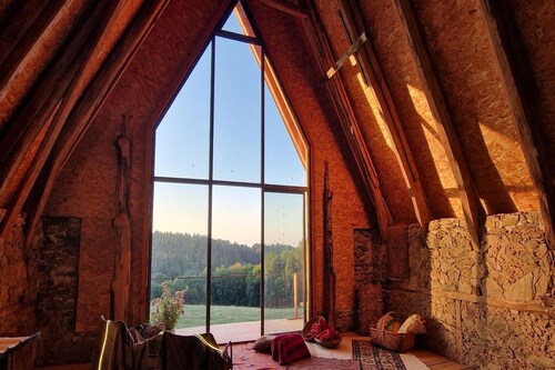 Wooden house in the heart of nature
