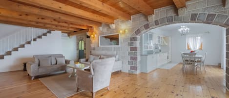 Standard Suite, Patio, Sea View | Living area