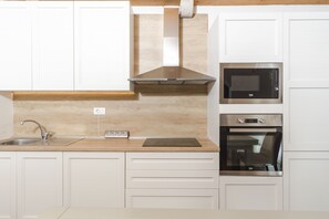 Junior Triple Room, Multiple Beds, Private Bathroom, Beach View | Private kitchen | Fridge, microwave, oven, stovetop - Castello deghli Aranci Eco Resort (Rezevici)