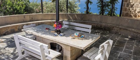 Suite, Patio, Sea View | Outdoor dining