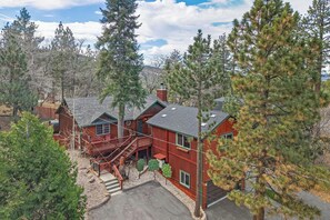 Exterior - Resort-Style Backyard with Sauna, Firepit & Putting Green! PET FRIENDLY! 2 Split Ductless Air Conditioning Units!FREE EV Charger! (Big Bear City)