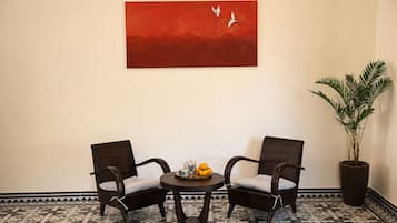 Deluxe Studio, 1 King Bed, Patio | Living area | Smart TV