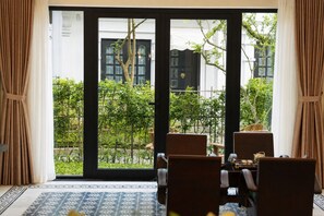 Deluxe Villa, 3 Bedrooms, Garden View | Living area | Smart TV - MUCA Hoian Co-living & Work Retreat (Hoi An)