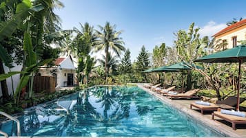 Outdoor pool, pool umbrellas, sun loungers