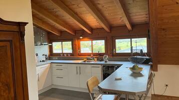 Fridge, stovetop, dishwasher, coffee/tea maker