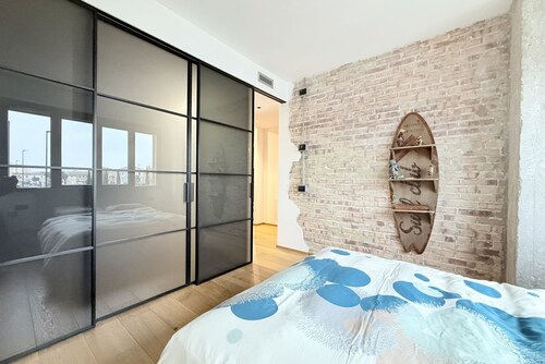 Location: Prime location, just steps from the sea, the Rotonda a Mare, and the historic center.Description: Located on the first floor, this new three-room apartment is furnished in an industrial style. The interior spaces are enhanced by exposed brick w