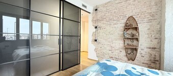 Location: Prime location, just steps from the sea, the Rotonda a Mare, and the historic center.Description: Located on the first floor, this new three-room apartment is furnished in an industrial style. The interior spaces are enhanced by exposed brick w