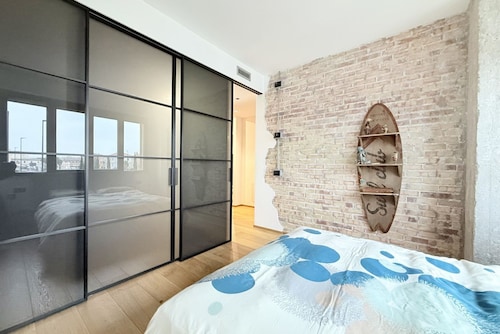 Location: Prime location, just steps from the sea, the Rotonda a Mare, and the historic center.Description: Located on the first floor, this new three-room apartment is furnished in an industrial style. The interior spaces are enhanced by exposed brick w