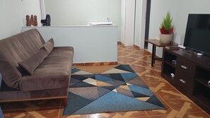 House, 3 Bedrooms, Smoking | Living area | Books - Luxury Spacious House up to 09 People on Guaritá Street (Fazenda Rio Grande)