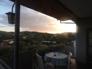 Outdoor dining - Stunning Panoramic View Swimming Pool 3-bedroom Apartment in the Luxury of Eros. (Windhoek)