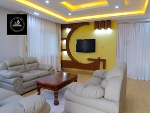 Luxury Double Room, Balcony, Lake View | Living area - Residence Six Sigma (Entebbe)