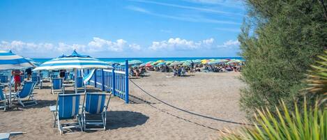 On the beach, white sand